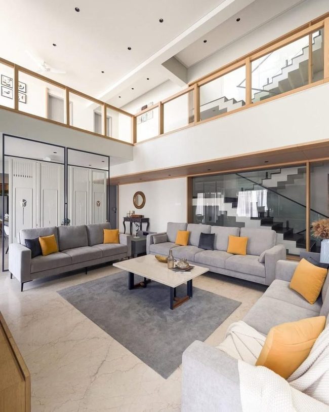 Two-Story Orange and Gray Living