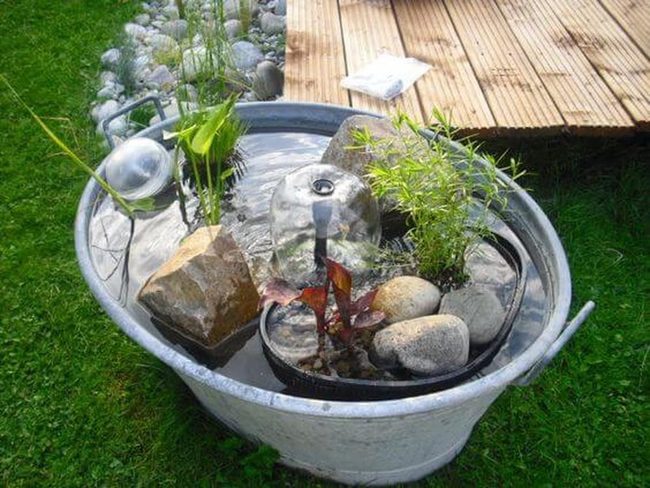 Weathered Metal Bucket Water Feature