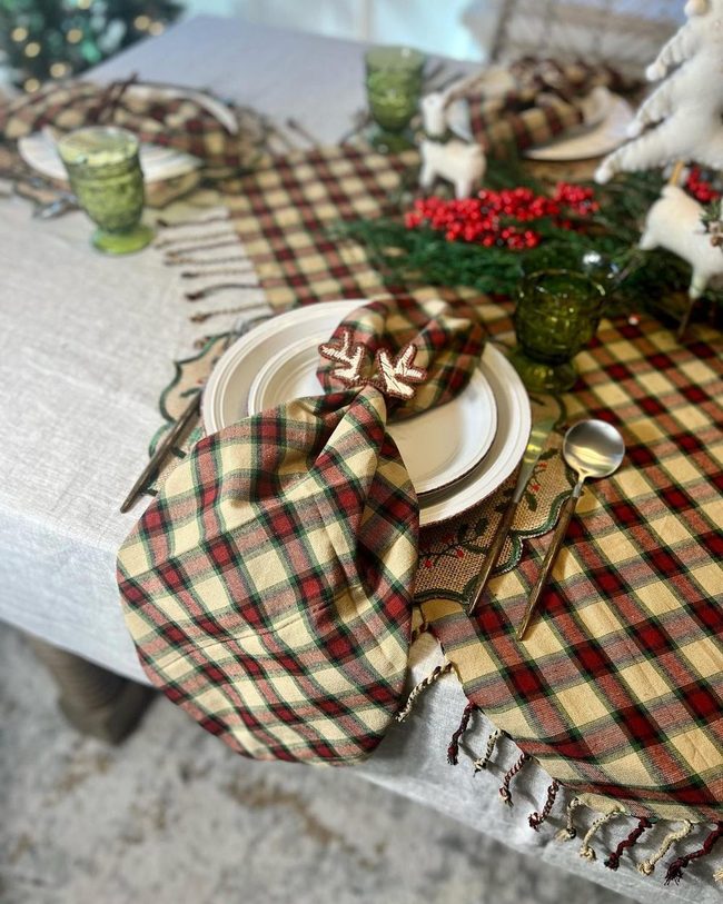 Red Checkered Table With Berry Centerpiece