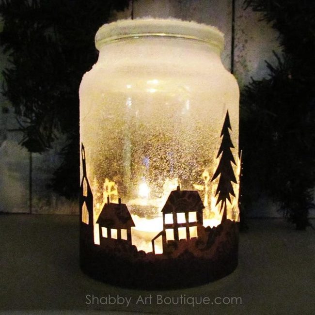 Illuminated Township Candles In Glass