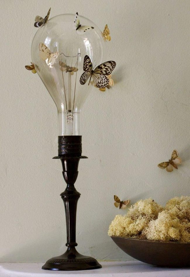 Lifelike Moths On Industrial Light