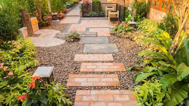 Terracotta Path Through Living Walls