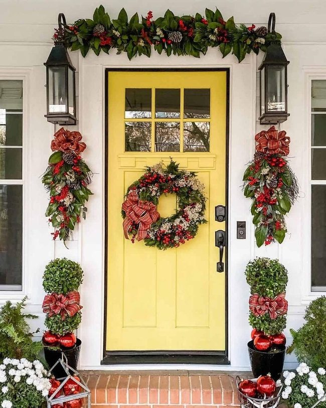 Sunny Yellow Door With Festive Wreaths