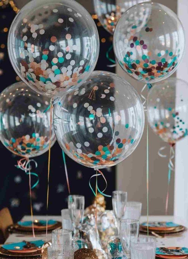 Clear Balloons With Shimmering Confetti Inside