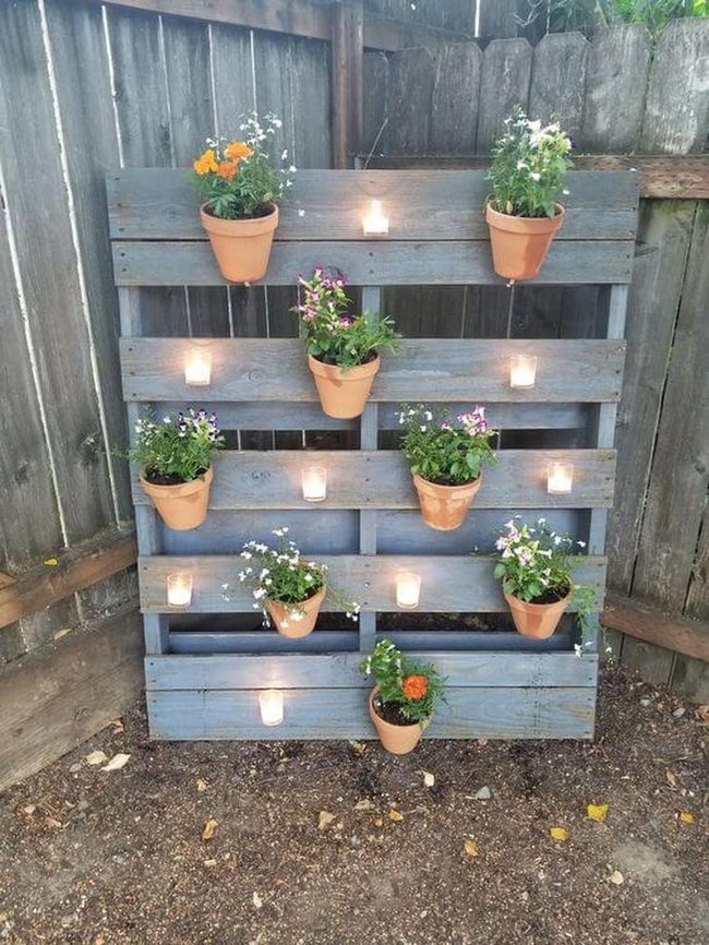 Terracotta Pots On Wooden Pallets