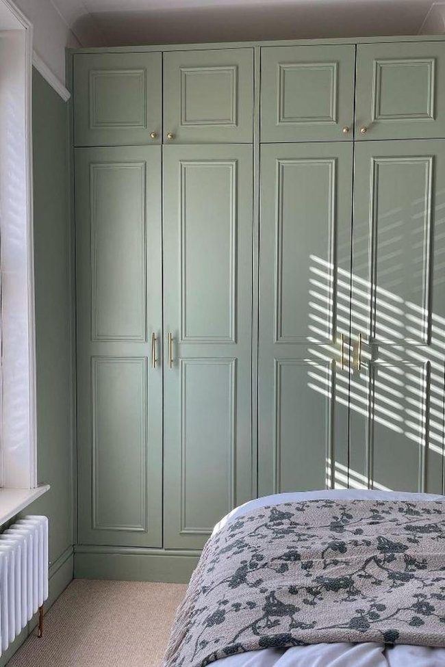 Sage Green Paneled Wardrobe With Gold Hardware
