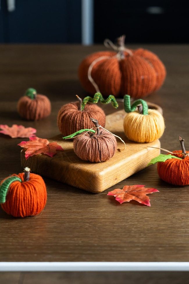 Orange Yarn Pumpkins On Wood