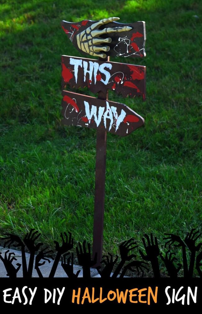 Dark Red Hand Signs On Grass