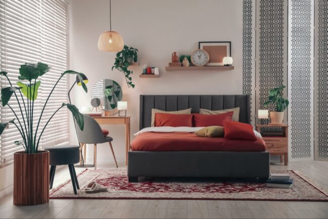 How Can I Balance Bold Red And Black Accents With Soothing Elements For A Relaxing Bedroom?